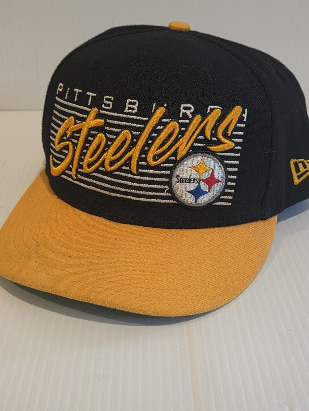 Pittsburgh Steelers Snapback Hat New Era Black Yellow Brim Embroidered Script